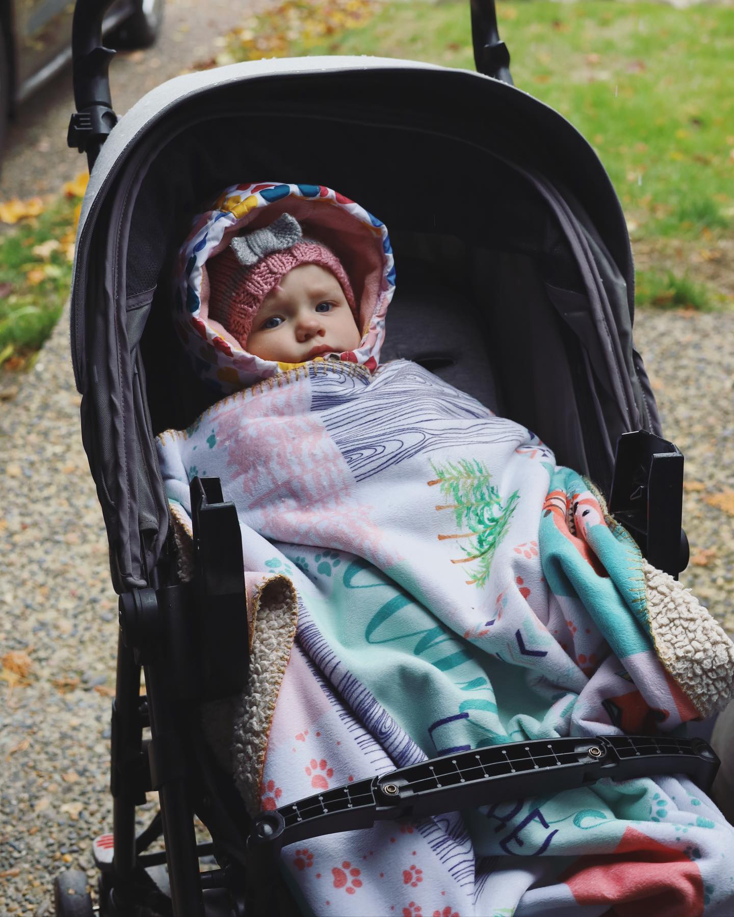 All bundled up for our walk in the snow flurries.